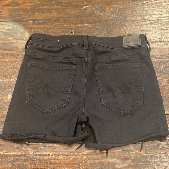 American Eagle Black Mid Rise Midi Stretch Cutoff Shorts in a size 4 - Picture 2 of 4
